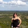 Woman at overlook at hill country state natural area